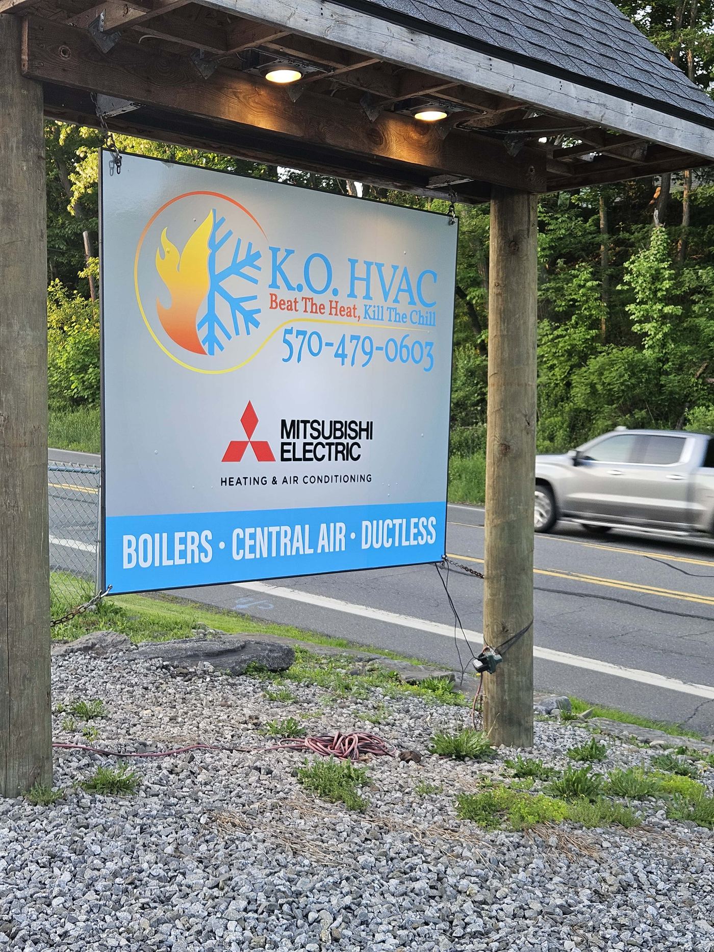 KO HVAC and Mitsubishi Electric sign outside company's Kingston, PA, office.