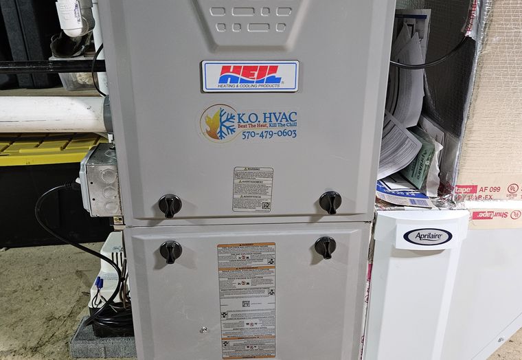 A gas furnace with a KO HVAC sticker