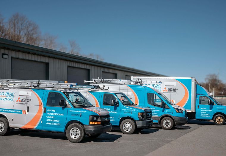 The KO HVAC fleet of vans and a box truck
