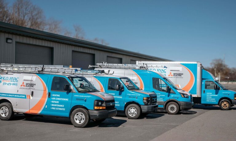 The KO HVAC fleet of vans and a box truck
